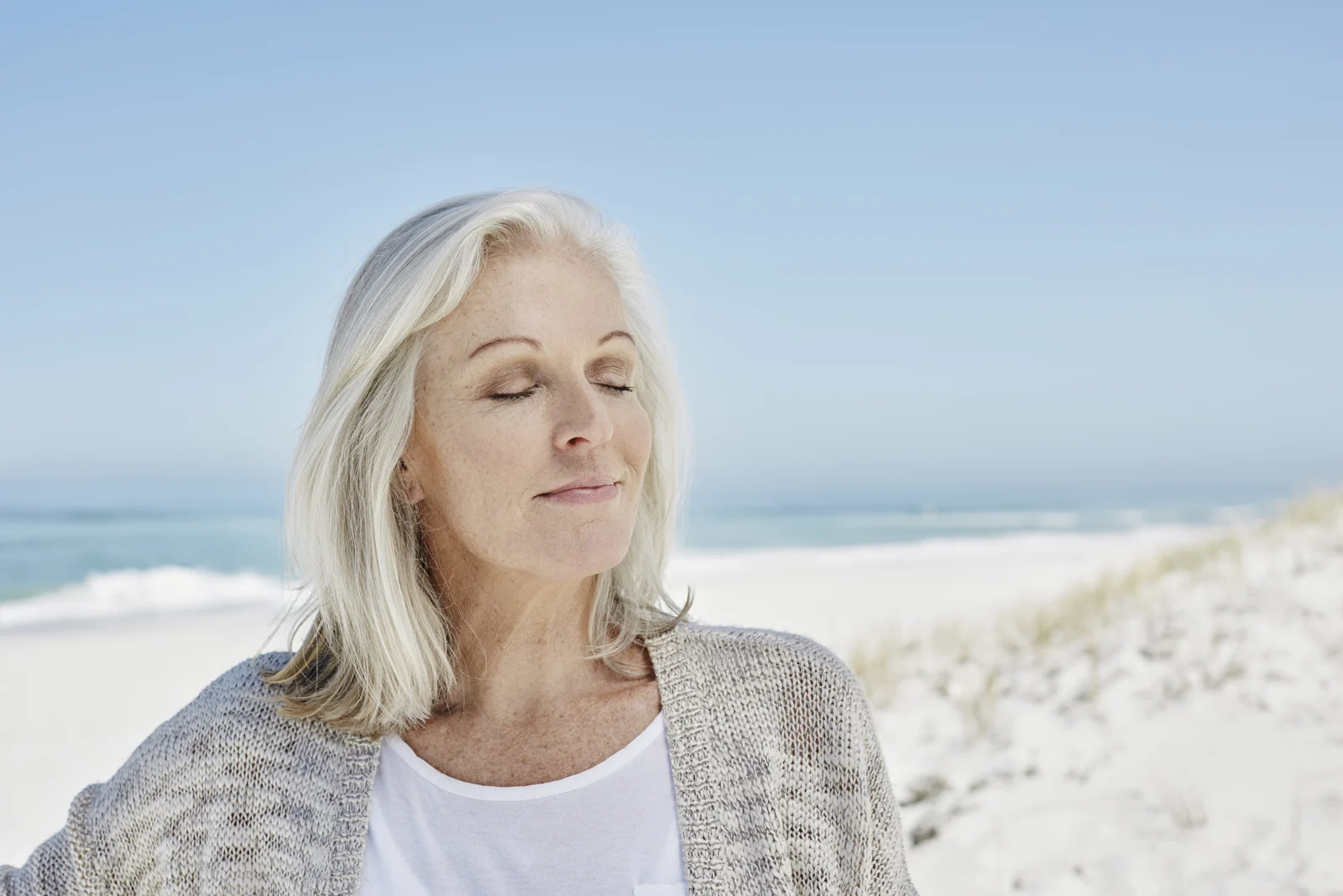 Senior Woman Relaxing on the Beach